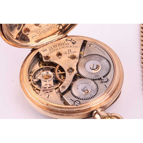 197 - A 9ct gold Waltham open-face pocket watch and a 9ct gold Albert chain. Featuring a keyless wound mov... 