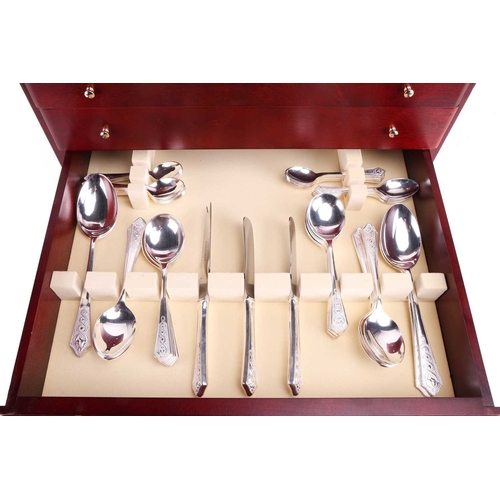 218 - A large Newbridge Silverware canteen of 'Celtic' pattern flatware, in a simulated mahogany four-draw... 