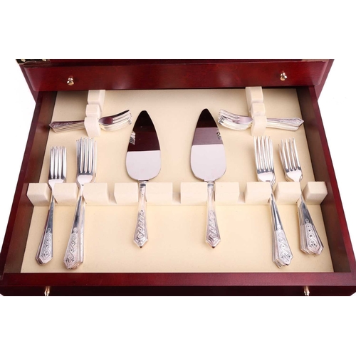 218 - A large Newbridge Silverware canteen of 'Celtic' pattern flatware, in a simulated mahogany four-draw... 