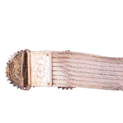 220 - A 19th-century Ottoman gilded ceremonial belt; the woven mesh belt with a filigree buckle, Ottoman m... 