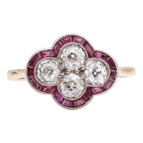 30 - An Art Deco diamond and ruby quatrefoil ring, the panel is constructed by four old-cut diamonds with... 