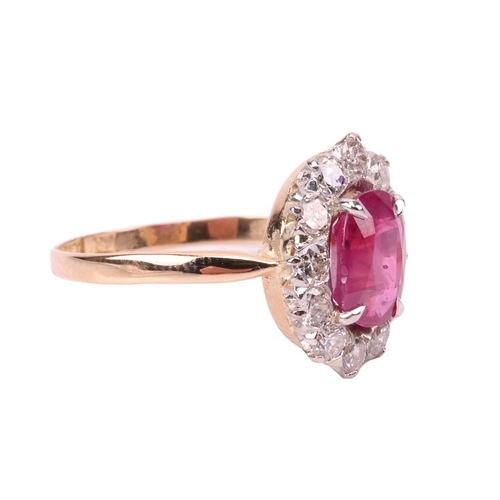 34 - An unheated Burmese ruby and diamond entourage ring, centred with a cushion-cut ruby of 1.37ct, appr... 