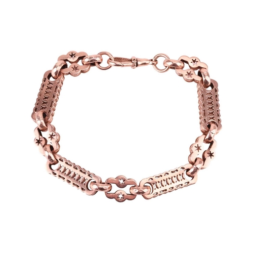 43 - A fancy link bracelet in 9ct rose gold, hollow links with pierced design and a scalloped edge, compl... 