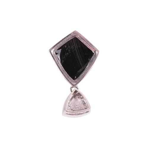 45 - A Whitby jet and labradorite pendant in 9ct white gold, containing a shield-shaped chequerboard face... 