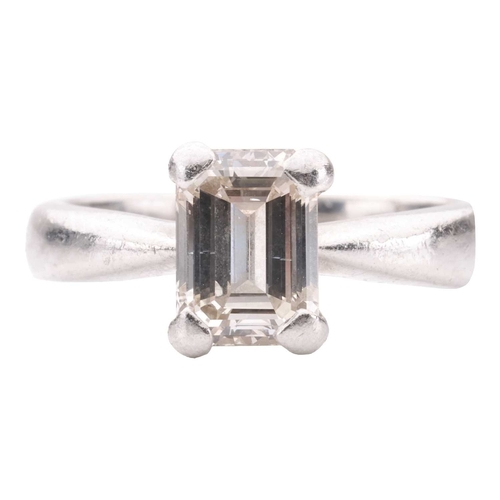 53 - A diamond solitaire ring, set with an emerald-cut diamond with an estimated weight of 1.20ct, in a c... 