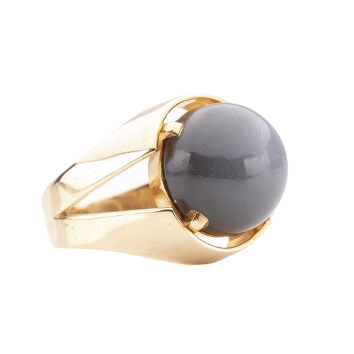 58 - A grey moonstone cabochon cocktail ring, featuring a round moonstone cabochon of 13.5 x 13.5 x 9.0 m... 