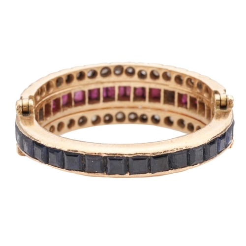 87 - A 'Day and Night' flip-over eternity ring, with half of the central band channel-set with table-cut ... 