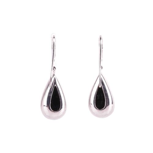 88 - A pair of Whitby jet and diamond drop earrings in 18ct white gold, each containing a teardrop-shaped... 