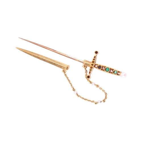 89 - A 19th century French emerald, diamond and seed pearl sword jabot pin, set with emeralds and rose cu... 