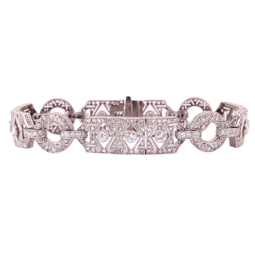 97 - An Art Deco diamond bracelet, set throughout with old cut, single cut and rose cut diamonds, with a ... 