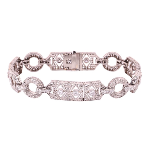 97 - An Art Deco diamond bracelet, set throughout with old cut, single cut and rose cut diamonds, with a ... 