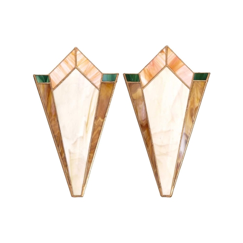 19 - Four Art Deco style coloured glass wall lights, in two pairs, the largest 46 cm x 26 cm, the smaller... 