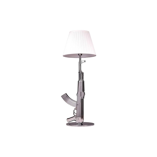 20 - Philippe Starck for Flos, a large chrome metal table lamp modelled as an AK47, the circular base imp... 