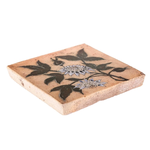 39 - A 19th-century stoneware tile, probably by Martin Brothers (unsigned), with incised floral decoratio... 