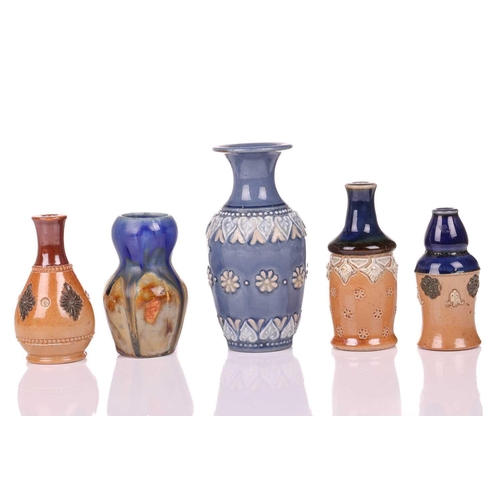 52 - A collection of late 19th / early 20th century Royal Doulton miniature stoneware vases, the tallest ... 