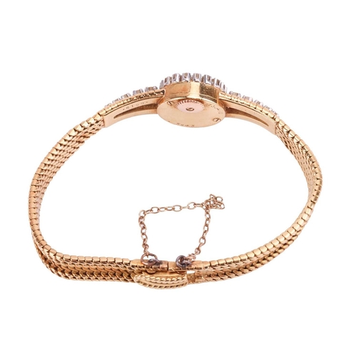 208 - A Cartier diamond set cocktail watch, featuring a hand-wound mechanical movement in an 18ct yellow g... 