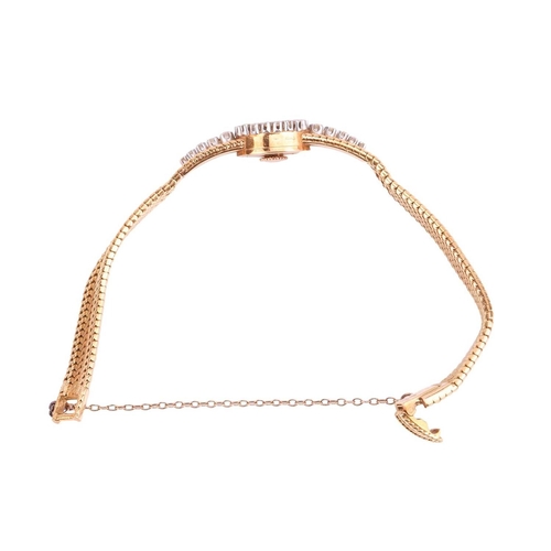 208 - A Cartier diamond set cocktail watch, featuring a hand-wound mechanical movement in an 18ct yellow g... 