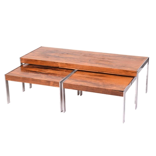 216 - Richard Young for Merrow Associates; 1970s, a nest of three matching coffee tables of rosewood and c... 