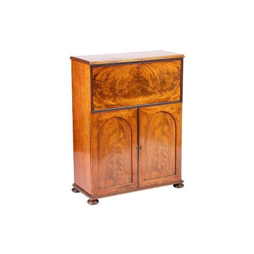 218 - An unusual Regency Mahogany Secretaire cabinet in the manner of Gillows of Lancaster, the top drawer... 