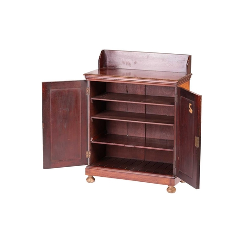 219 - An unusually small mahogany chiffonier, Regency and later, with a shaped splash back over a pair of ... 