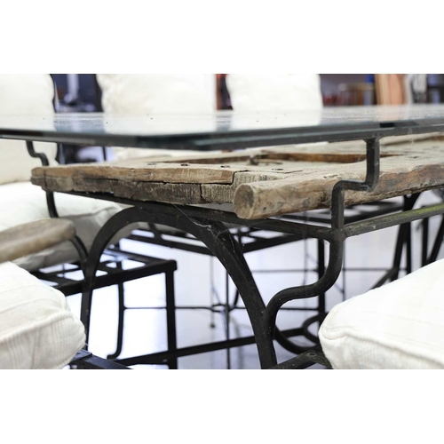 226 - Large rectangular blacksmith-made, black wrought iron garden table, 20th century, with heavy plate g... 