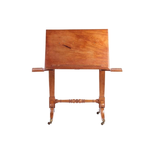 229 - A George IV mahogany Architect's Table, the rectangular adjustable slope top with moulded edge, book... 