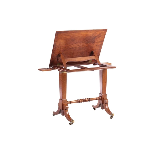 229 - A George IV mahogany Architect's Table, the rectangular adjustable slope top with moulded edge, book... 