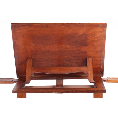 229 - A George IV mahogany Architect's Table, the rectangular adjustable slope top with moulded edge, book... 