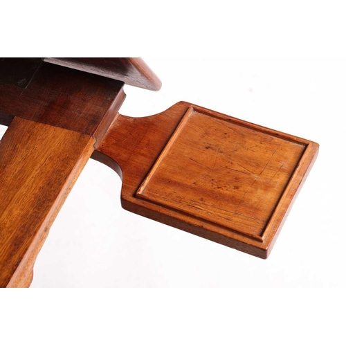 229 - A George IV mahogany Architect's Table, the rectangular adjustable slope top with moulded edge, book... 