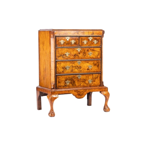 234 - A Queen Anne-style figured walnut chest on stand, early 20th century, of small proportions, with cro... 