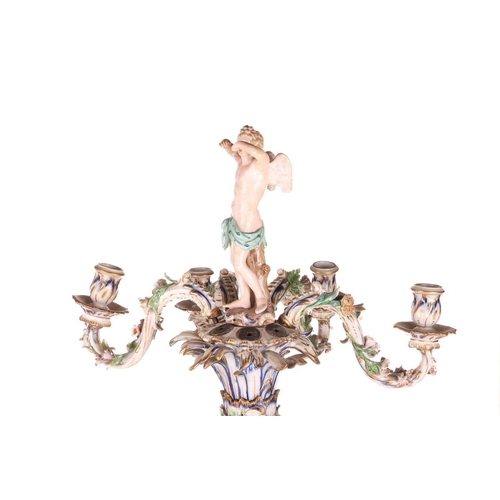 259 - A large and impressive Meissen figural porcelain table centre, 19th century, with an adolescent Cupi... 