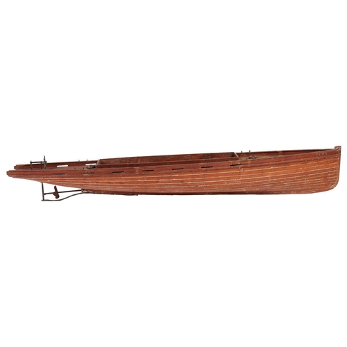 263 - A large vintage motor yacht hull, the teak planked body bearing the name 