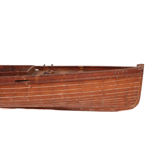 263 - A large vintage motor yacht hull, the teak planked body bearing the name 