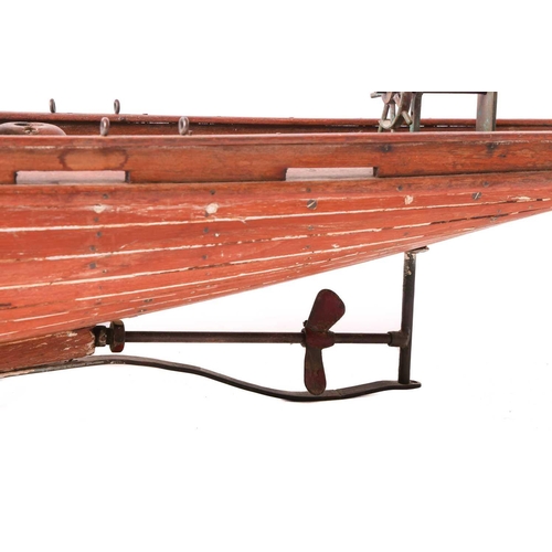 263 - A large vintage motor yacht hull, the teak planked body bearing the name 