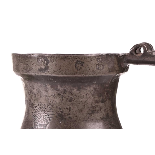 267 - An early 18th century English pewter gallon capacity measure, of baluster form, marked 'HR' with Cro... 