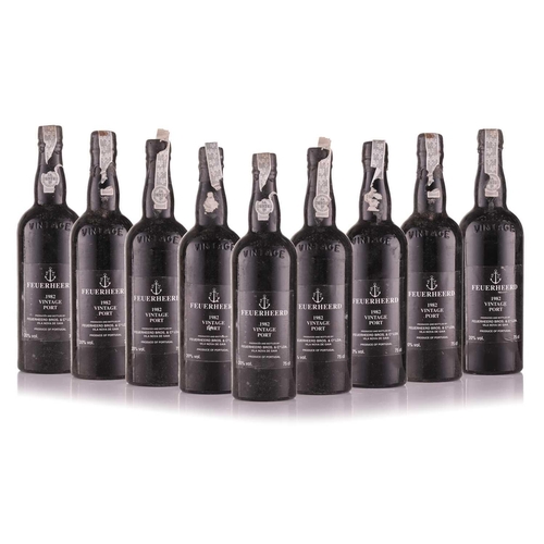 301 - Nine Bottles of Feuerheerd Vintage Port, 1982, in a wooden case (not original). Cellar in Blackheath... 