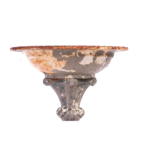 233A - A Coalbrookdale-style cast iron pedestal bird bath with established weathered surface, the circular ... 