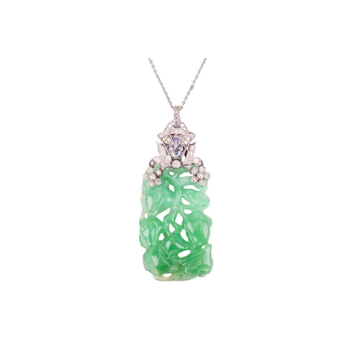 41 - An Art Deco carved jade pendant with diamond-set surmount on chain, the rectangular bright green jad... 