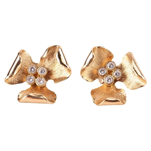 115 - A pair of diamond-set floral stud earrings with exchangeable gilt petals, stamens embellished with f... 