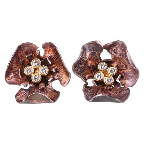 115 - A pair of diamond-set floral stud earrings with exchangeable gilt petals, stamens embellished with f... 