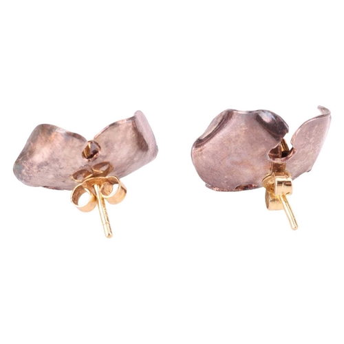 115 - A pair of diamond-set floral stud earrings with exchangeable gilt petals, stamens embellished with f... 