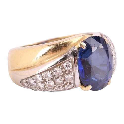 120 - A gem-set dress ring, centred with an oval-cut synthetic sapphire of 11.9 x 9.8 x 6.8 mm, claw-set b... 