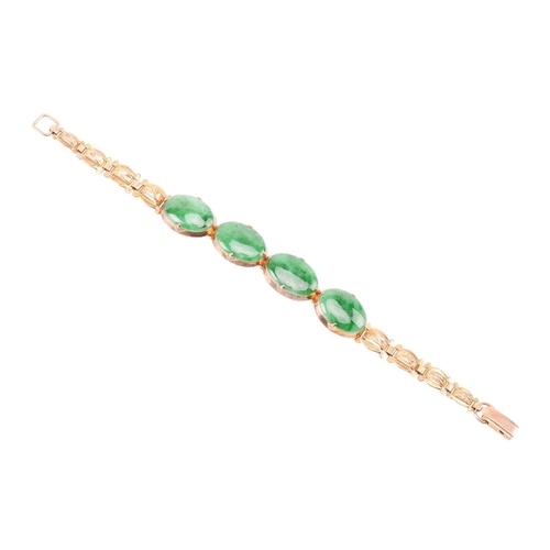 29 - A jade link bracelet, comprising four oval jadeite cabochons in of dark green colour, approximately ... 