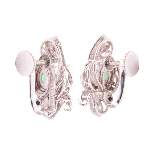 33 - A pair of jade and diamond earrings, each contains an oval jadeite cabochon of bright green colour, ... 