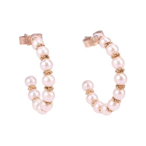 43 - A Mikimoto cultured pearl choker and a pair of matching earrings; the choker comprising five rows of... 