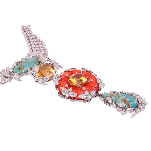 57 - A floral necklace and earrings ensuite set with carved coral, turquoise, citrine and diamond; the ne... 