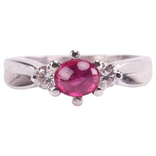 86 - A ruby cabochon and diamond dress ring, centred with an oval ruby cabochon of 5.9 x 5.0 x 2.8 mm, in... 