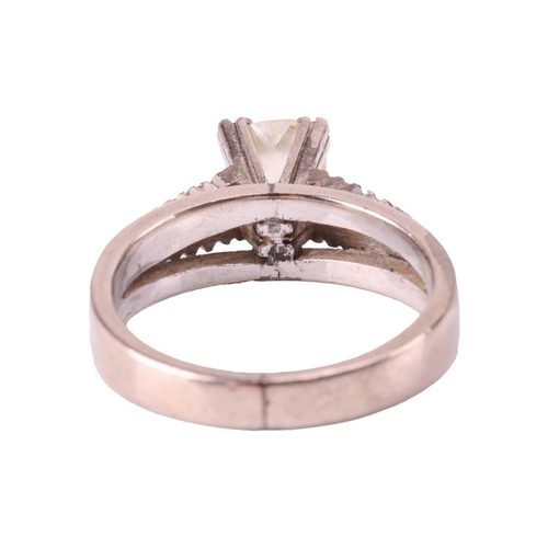 90 - A diamond solitaire ring, featuring an old-cut diamond measuring approximately 5.1mm - 5.2mm, with a... 