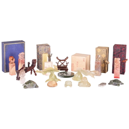 118 - A small collection of Chinese decorative jade and other stone carvings, including two jade fan tail ... 