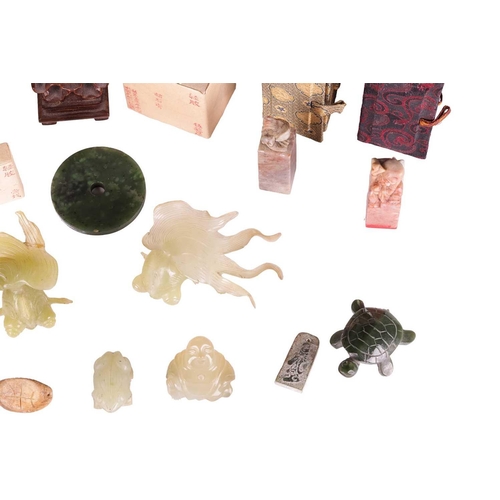 118 - A small collection of Chinese decorative jade and other stone carvings, including two jade fan tail ... 